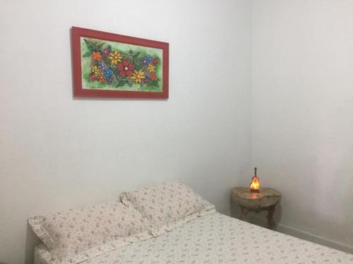 Ένα ή περισσότερα κρεβάτια σε δωμάτιο στο Gira Arte Hostel