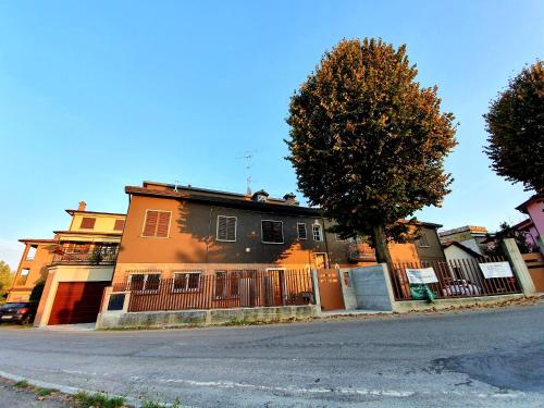 a house on the side of a street at la Brunita in Rubiera