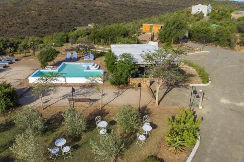 La alberca dentro o cerca de Le Petit Karoo Ranch