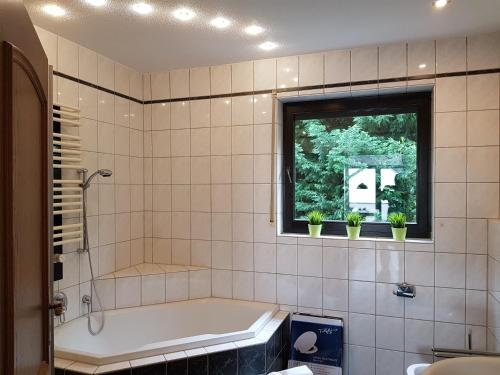 Ванная комната в FewoSa Trier-Tarforst