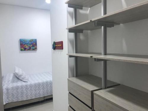 Ein Etagenbett oder Etagenbetten in einem Zimmer der Unterkunft Apartamento en Santa Marta - Samaria junto a la Playa Pozos Colorados