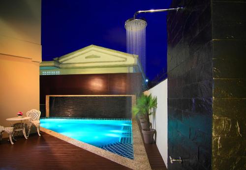 Bazén v ubytování Cool Residence Hotel nebo v jeho okolí