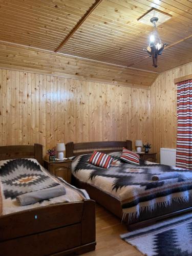 Tempat tidur dalam kamar di Світанкове Сяйво