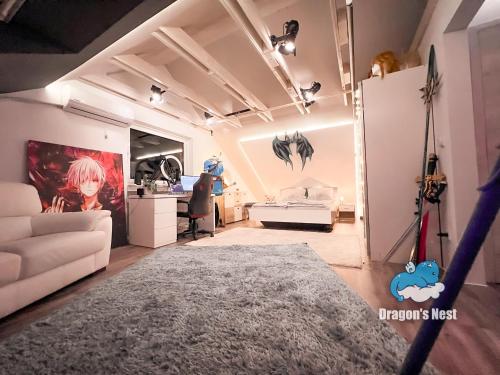 a bedroom with a bed and a desk in a room at Dragon’s Nest: Cozy & modern attic loft Nuremberg in Schwaig bei Nürnberg