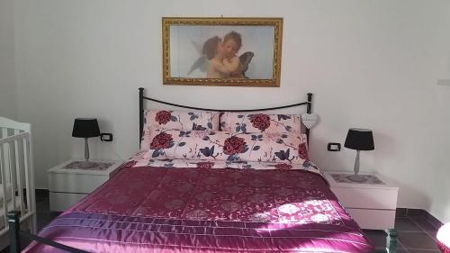 Ένα ή περισσότερα κρεβάτια σε δωμάτιο στο Da Martina