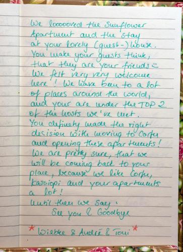 a letter from a woman complaining that her handwriting was sloppy at Nicola's Apartments in Kassiopi