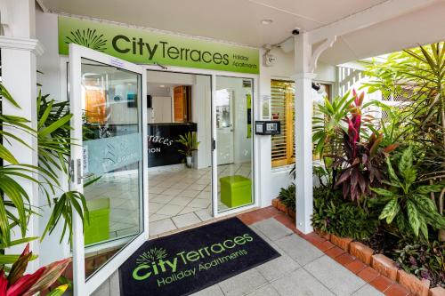 a sign in front of a building at City Terraces Cairns in Cairns