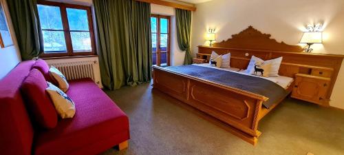 Ένα ή περισσότερα κρεβάτια σε δωμάτιο στο Villa Alpenblick