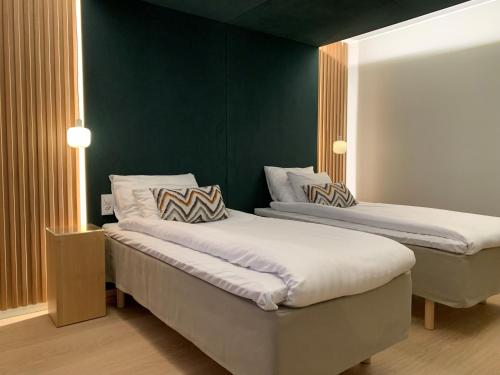 Postel nebo postele na pokoji v ubytování Park Hotel Tornio