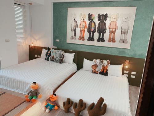 Katil atau katil-katil dalam bilik di Tainan Anping AP7 B&B