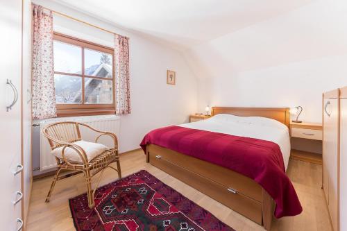 מיטה או מיטות בחדר ב-Hiša nasproti sonca