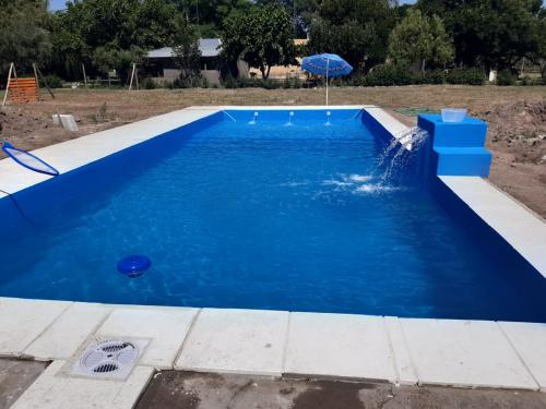 Swimming pool sa o malapit sa El Nevado Casa de Campo