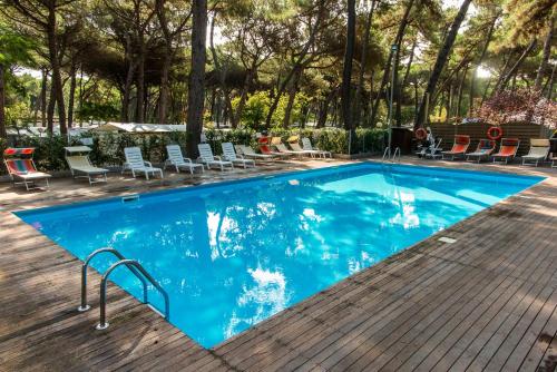 The swimming pool at or close to Club del Sole Marina Romea Easy Camping Village