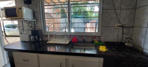 Η κουζίνα ή μικρή κουζίνα στο Merlo 1