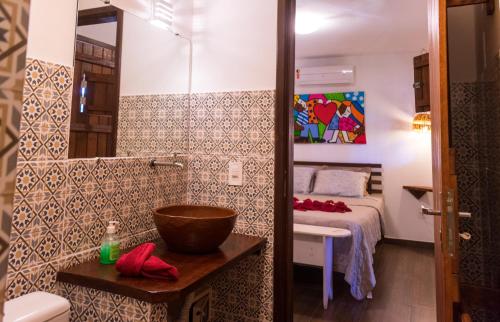 Kylpyhuone majoituspaikassa Pousada Casa Do Cocotier