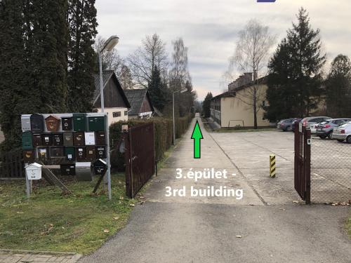 a street with a cylinder butt building at Happy Bunnies Apartman I - Gunarasfürdő in Dombóvár