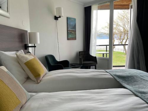 เตียงในห้องที่ Hardangerfjord Hotel