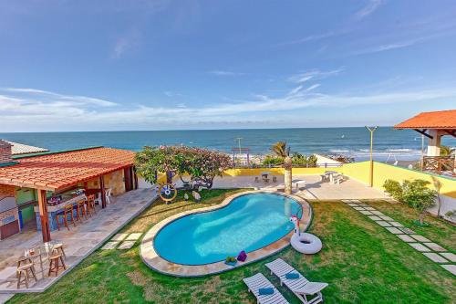 Casa incrivel na beira mar da Praia de Iguape por Carpediem