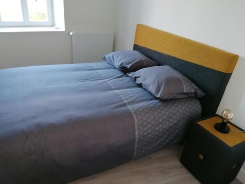 Postel nebo postele na pokoji v ubytování La Poire en 2