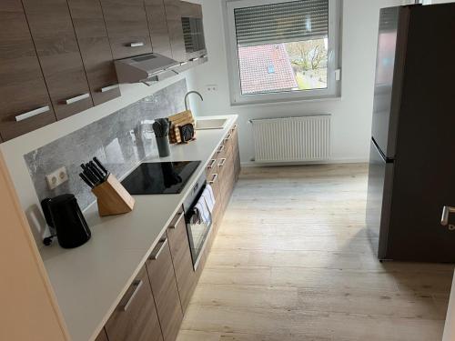 a kitchen with a sink and a counter top at Monteurwohnung Pforzheim Zentrum in Pforzheim