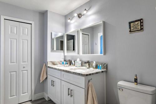 a bathroom with a sink and a toilet at Updated Tavares Retreat Less Than 1 Mile to Boat Ramp in Tavares