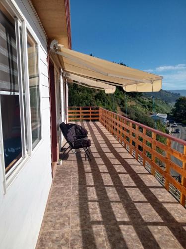 Un balcón o terraza de Cabañas Centenilla
