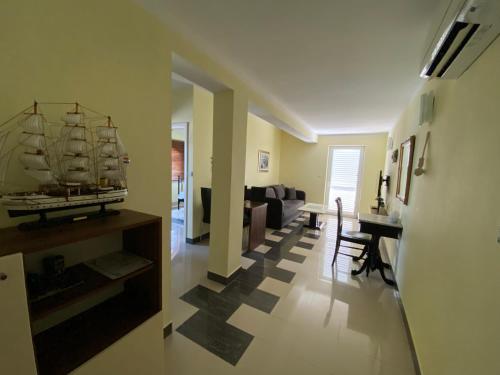 a living room with a pirate ship on the wall at Apartments Villa Lora in Kraj