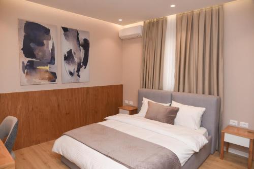 Postel nebo postele na pokoji v ubytování J&D Rooms Korce