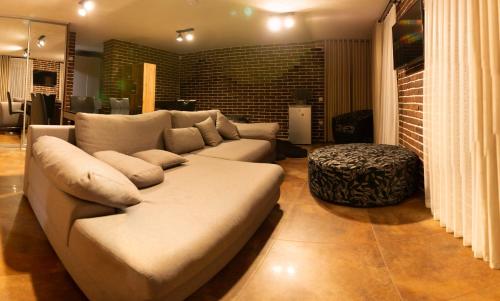 a living room with a couch and a table at Green Zone in Migovo