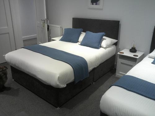 מיטה או מיטות בחדר ב-Taigh Duitseach