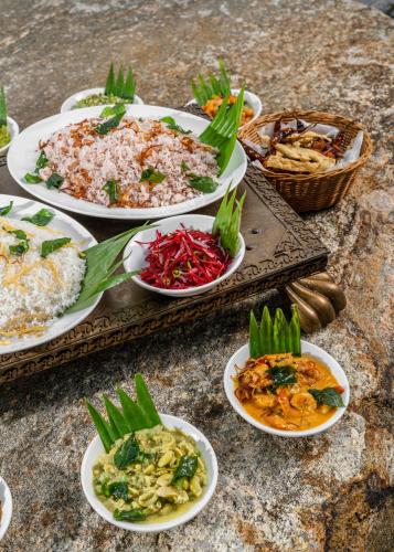 a group of plates of food on a table at Wild Culture Yala in Yala
