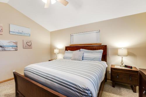 a bedroom with a large bed and two night stands at The Hidden Treasure in Warrenton
