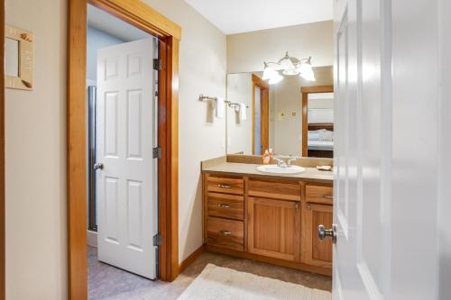 a bathroom with a sink and a mirror at The Hidden Treasure in Warrenton