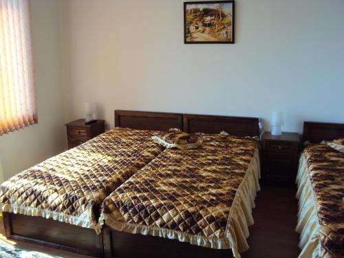 Ένα ή περισσότερα κρεβάτια σε δωμάτιο στο House Mirlevi