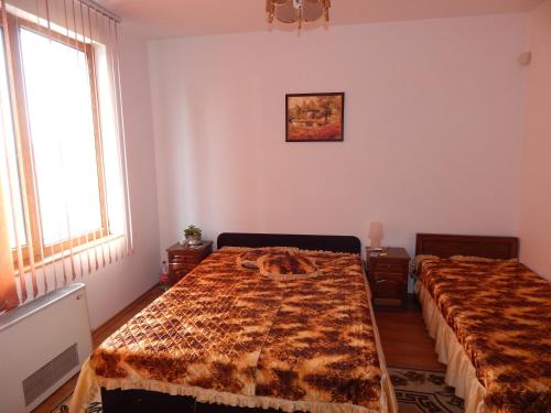 Ένα ή περισσότερα κρεβάτια σε δωμάτιο στο House Mirlevi