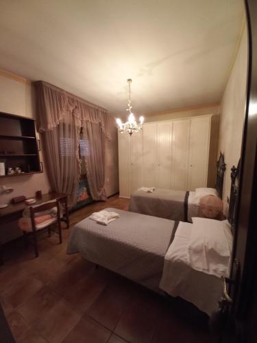 Postel nebo postele na pokoji v ubytování Casa Guerrino