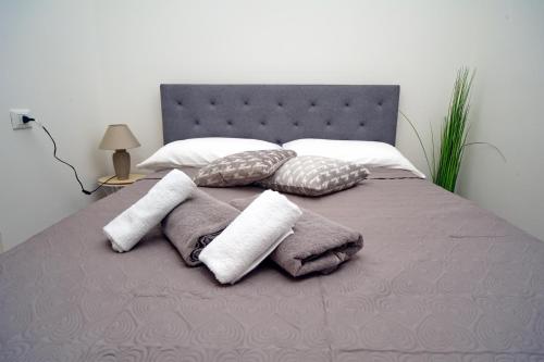 Cama o camas de una habitación en B&B Clesio & Residence Buonconsiglio Apartments
