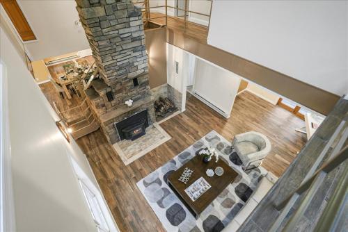 an overhead view of a living room with a fireplace at Charming 3BR 3Bath In Brilliant Location! in Monroe