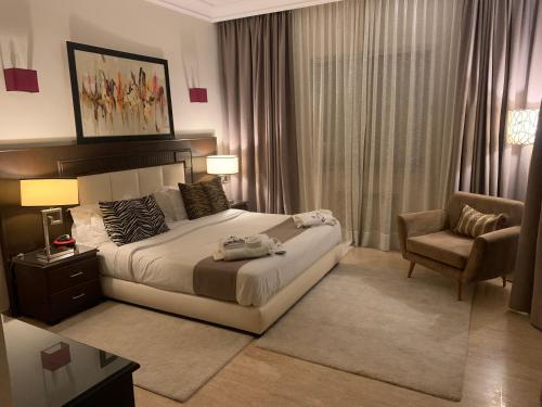 Un pat sau paturi într-o cameră la Villa Oree Du Parc