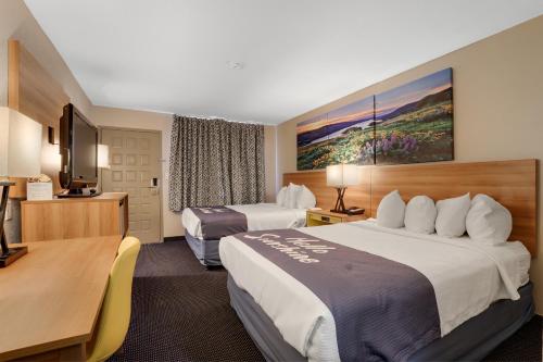 Ένα ή περισσότερα κρεβάτια σε δωμάτιο στο Days Inn & Suites by Wyndham Needles