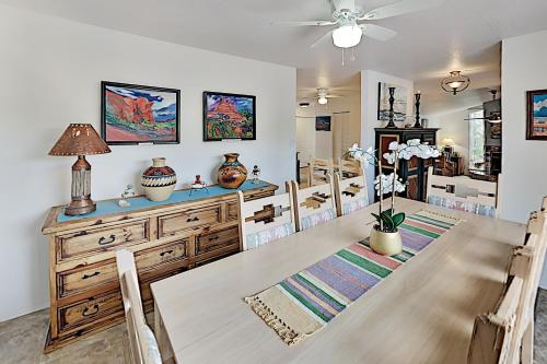 a dining room with a table and chairs at Casa Azul in Western Sedona in Sedona