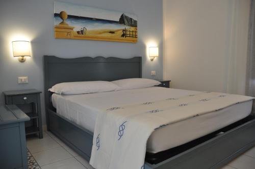 Posteľ alebo postele v izbe v ubytovaní Athena Bed & Breakfast