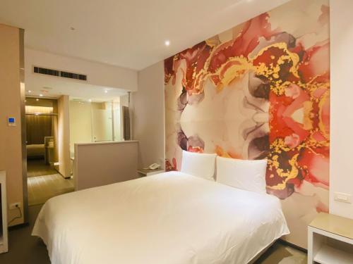  Una cama o camas en una habitación de Artinn Hotel 