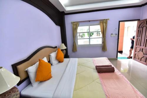 Postel nebo postele na pokoji v ubytování Ampan Resort & Apartment