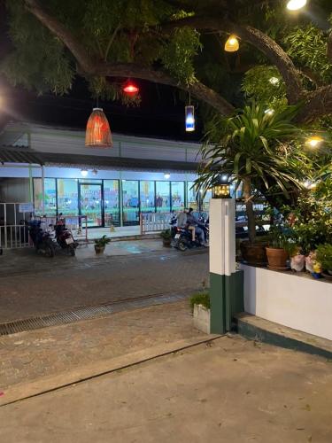 a building with motorcycles parked inside of it at วินเนอร์วิว เกาะล้าน-winnerview Kohlarn seaview in Ko Larn