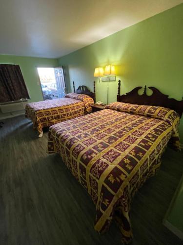 Ένα ή περισσότερα κρεβάτια σε δωμάτιο στο Relax Inn Dublin