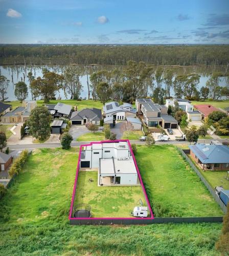 an aerial view of a house with a large yard at Bundalong river retreat in Bundalong