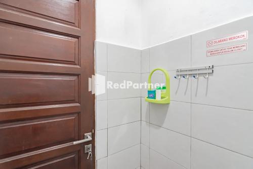 サマリンダにあるLangkar Guest House Syariah Mitra RedDoorzのギャラリーの写真