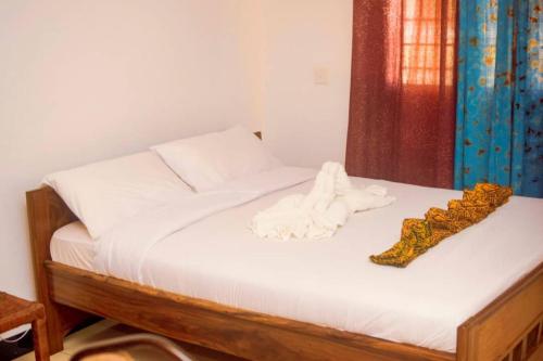 Katil atau katil-katil dalam bilik di MaTemu Square - 12 Cottages Breakfast Swimming
