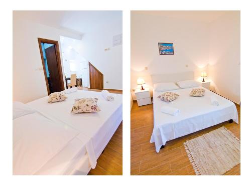 ein Schlafzimmer mit 2 Betten und ein Zimmer mit 2 Tischen in der Unterkunft Luxury Old Town Suites in Split